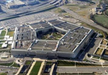 This picture taken 26 December 2011 shows the Pentagon building in Washington, DC. The Pentagon, which is the headquarters of the United States Department of Defense (DOD), is the world's largest office building by floor area, with about 6,500,000 sq ft (600,000 m2), of which 3,700,000 sq ft (340,000 m2) are used as offices. Approximately 23,000 military and civilian employees and about 3,000 non-defense support personnel work in the Pentagon. AFP PHOTO (Photo by STAFF / AFP) (Photo by STAFF/AFP via Getty Images)